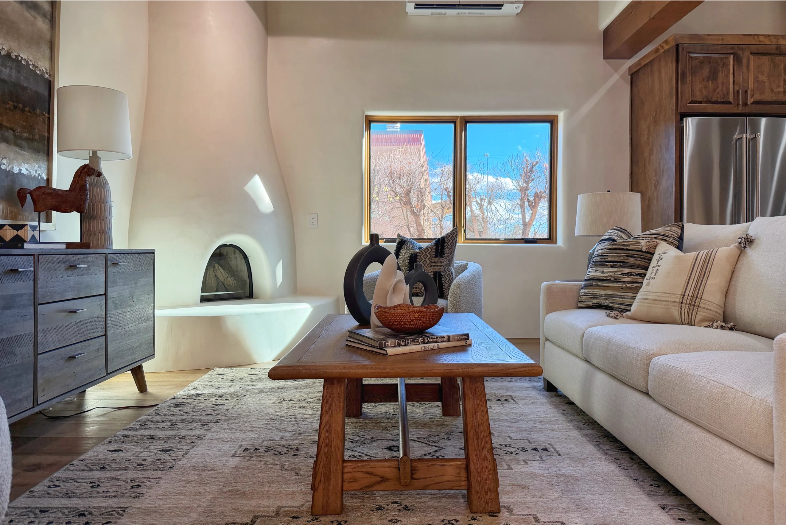 Cozy living room with southwestern decor and a scenic window view.
